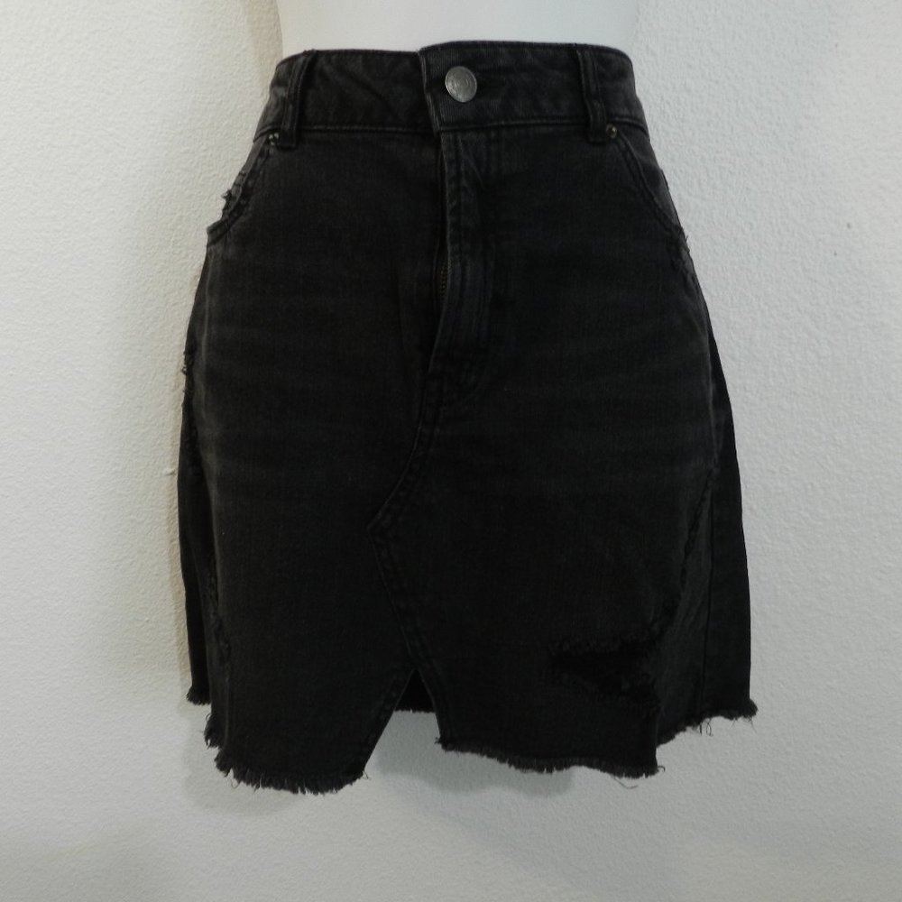 Distressed black denim skirt, 5-pocket style with zipper, V-front, raw edge hem